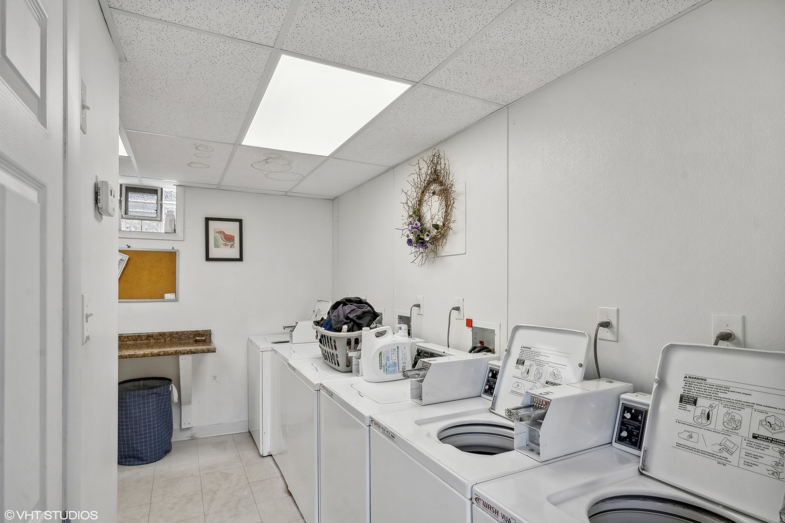 1050 West Byron Street, Unit 3W Chicago, IL 60613 - Photo 22 of 23 a kitchen with a sink and a stove top oven