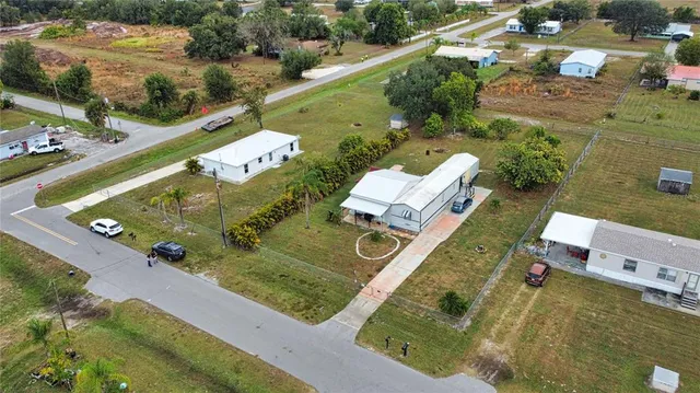 an aerial view of a house with a garden
