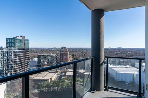 a view of a balcony with a street from a balcony