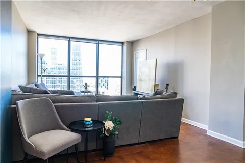 a kitchen with stainless steel appliances granite countertop a sink and cabinets