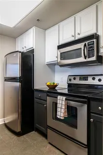 a kitchen with a sink and a window