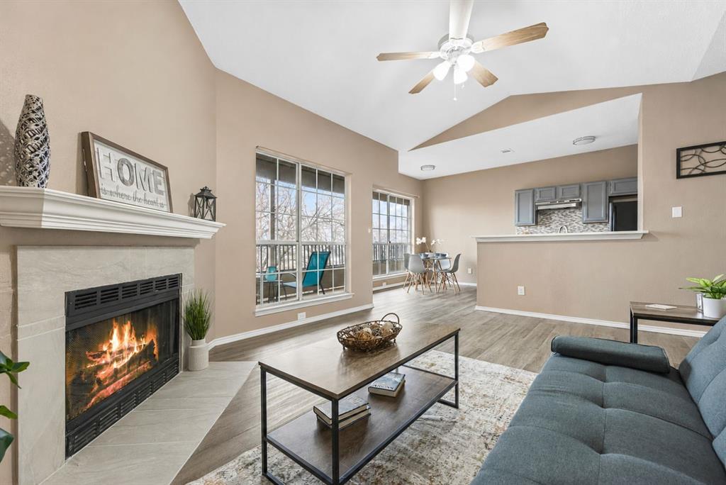 4113 Esters Road, Unit 609 Irving, TX 75038 - Photo 9 of 18 a living room with furniture and a fireplace
