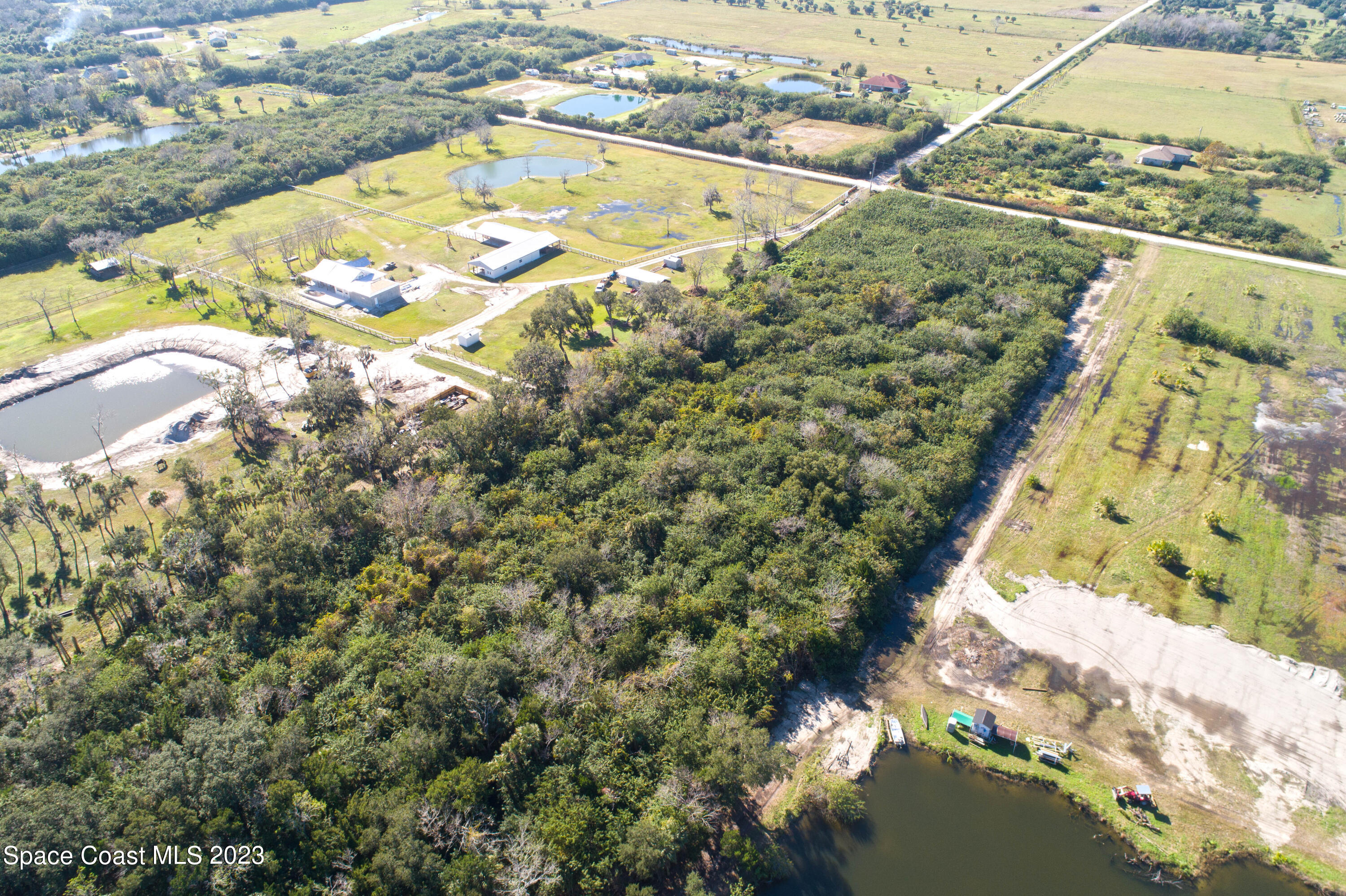 3495 Hammock Road Mims, FL 32754 - Photo 12 of 20 a view of a lake