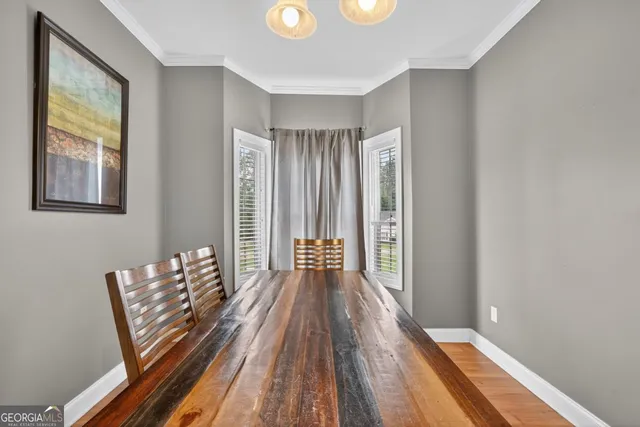 a kitchen with stainless steel appliances granite countertop a refrigerator stove and sink