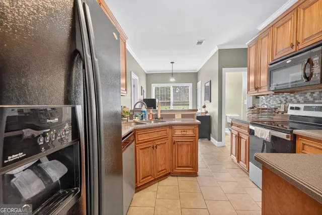 a view of a kitchen with stove