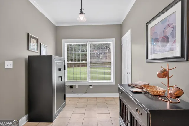 a bathroom with a toilet and a mirror