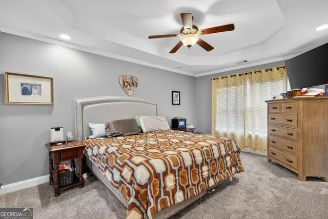a bathroom with double vanity sinks and a mirror