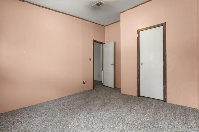 an empty room with closet