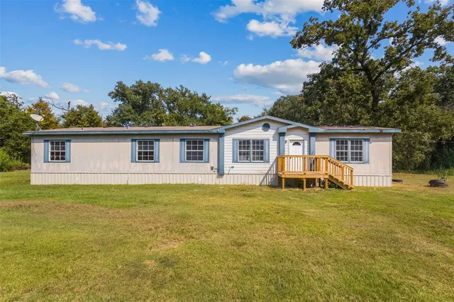 a view of a house with a patio