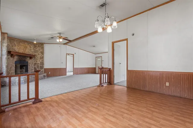 a view of livingroom with hardwood floor and ceiling fan
