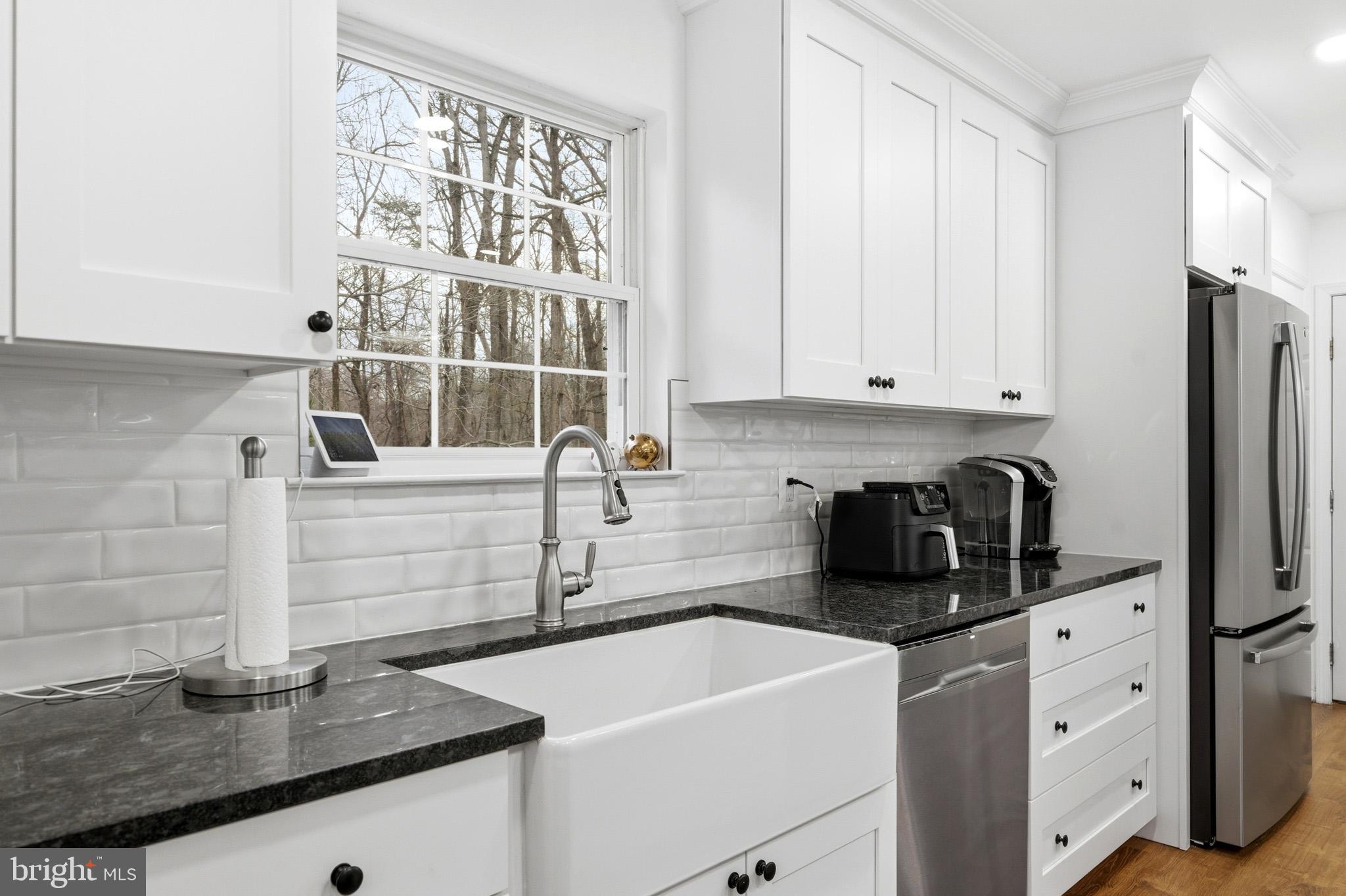 1970 Lowery Road Huntingtown, MD 20639 - Photo 18 of 46 Deep farmhouse sink with kitchen window.