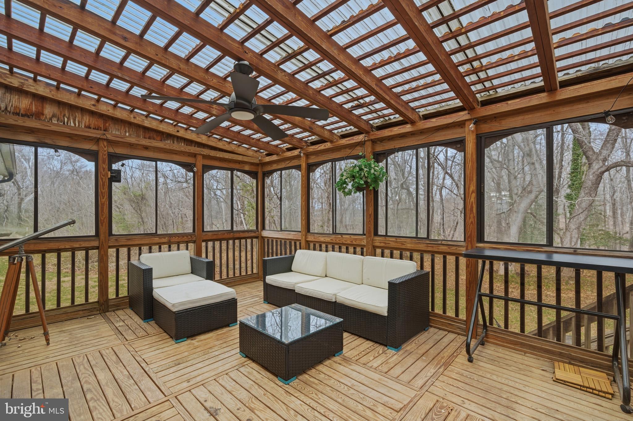 1970 Lowery Road Huntingtown, MD 20639 - Photo 21 of 46 Step outside into the large screened deck.