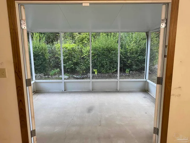 a view of a garden with an outdoor space