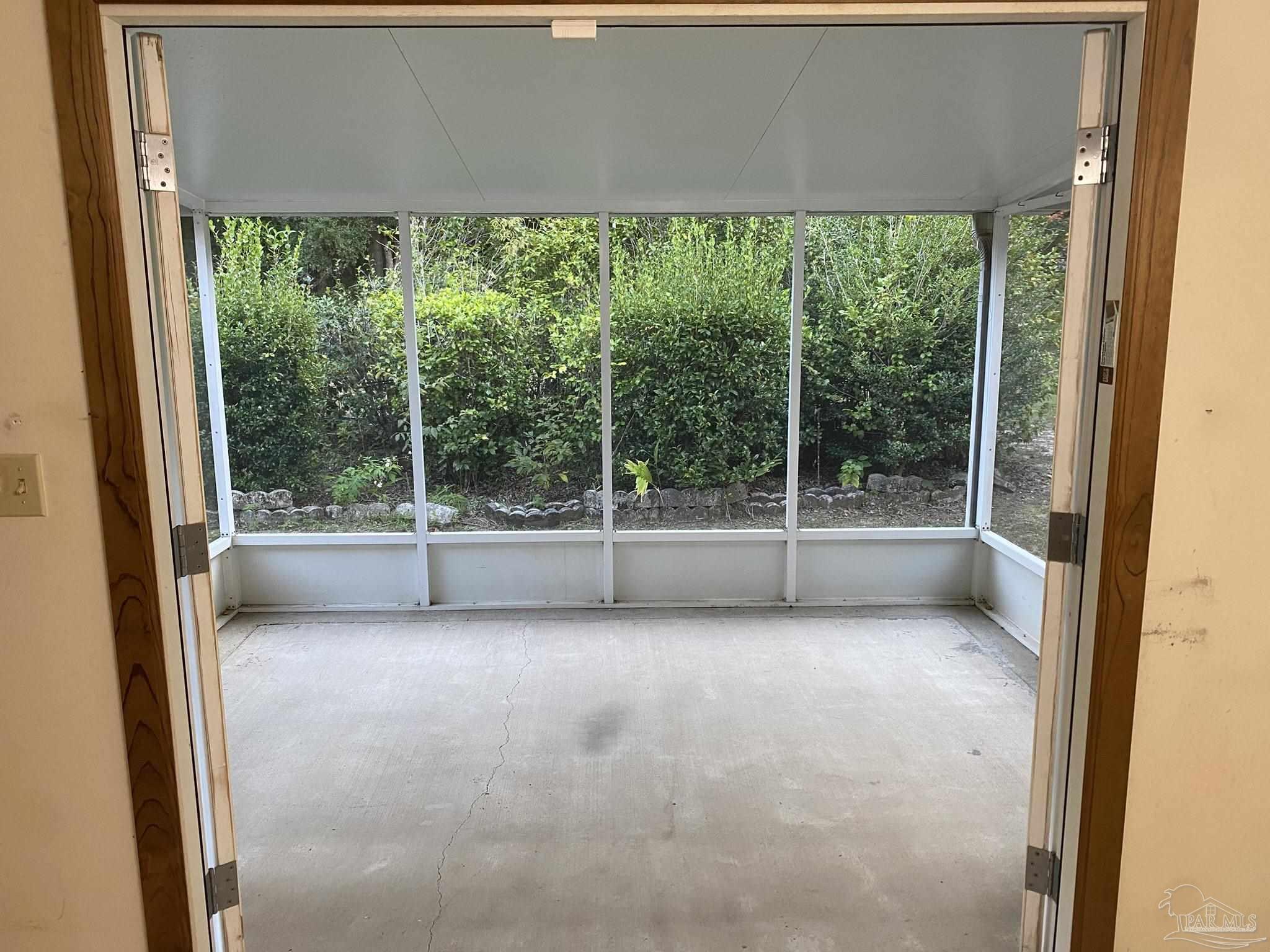 6333 Rice Street Milton, FL 32583 - Photo 14 of 19 a view of a garden with an outdoor space