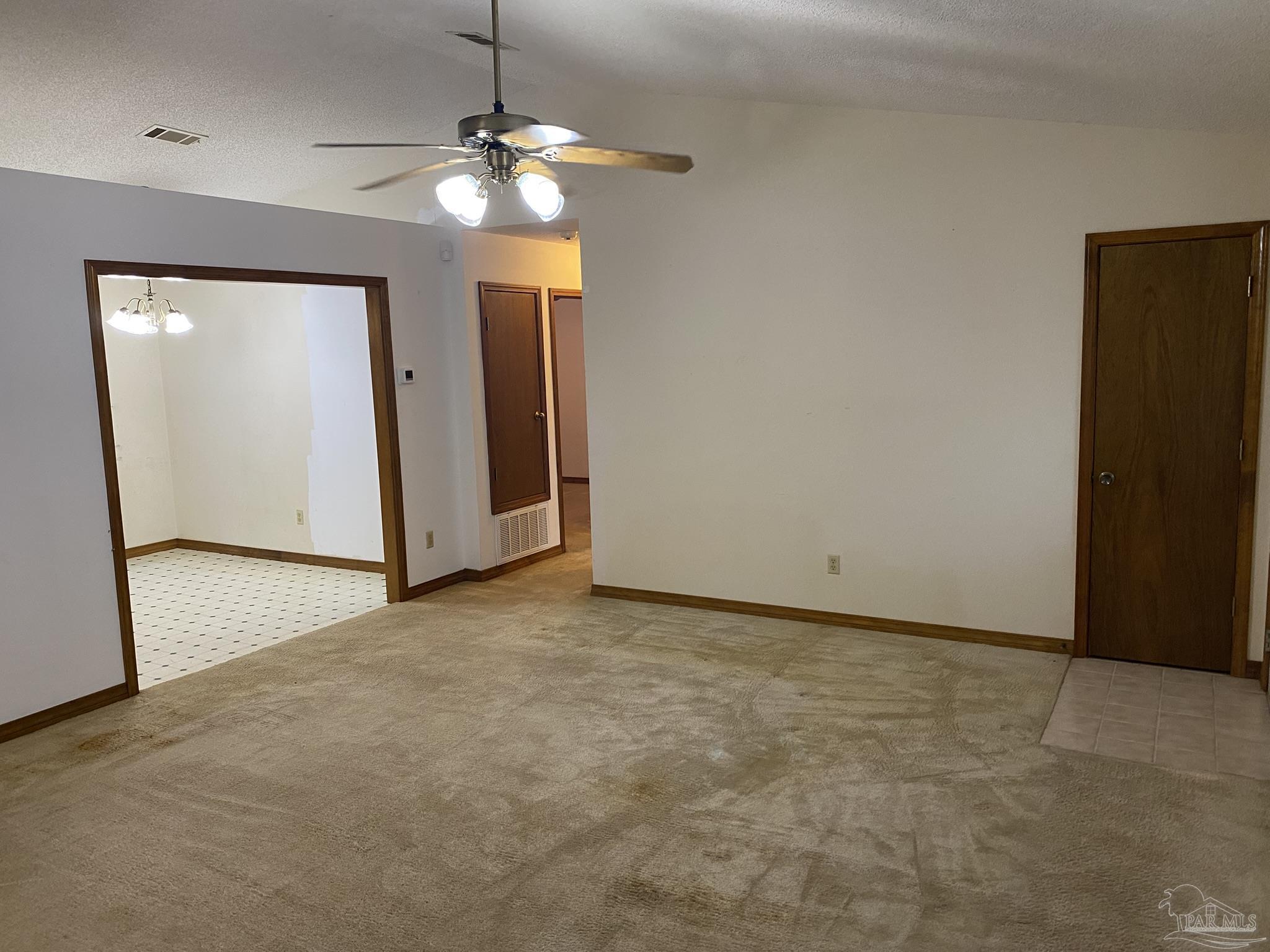 6333 Rice Street Milton, FL 32583 - Photo 8 of 19 a view of an empty room with a cabinet