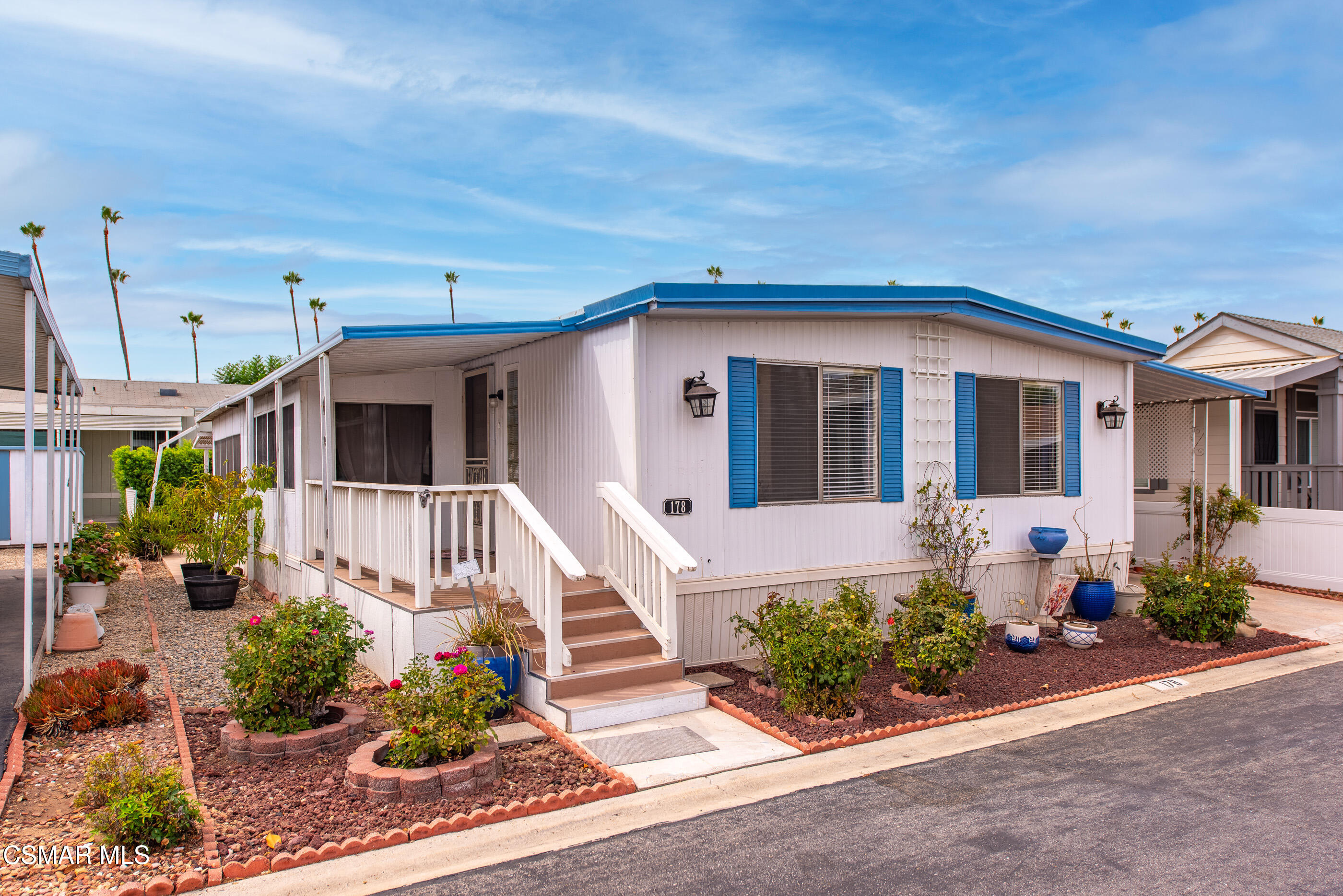195 Tierra Rejada Road, Unit 178 Simi Valley, CA 93065 - Photo 1 of 49 a front view of a house with garden
