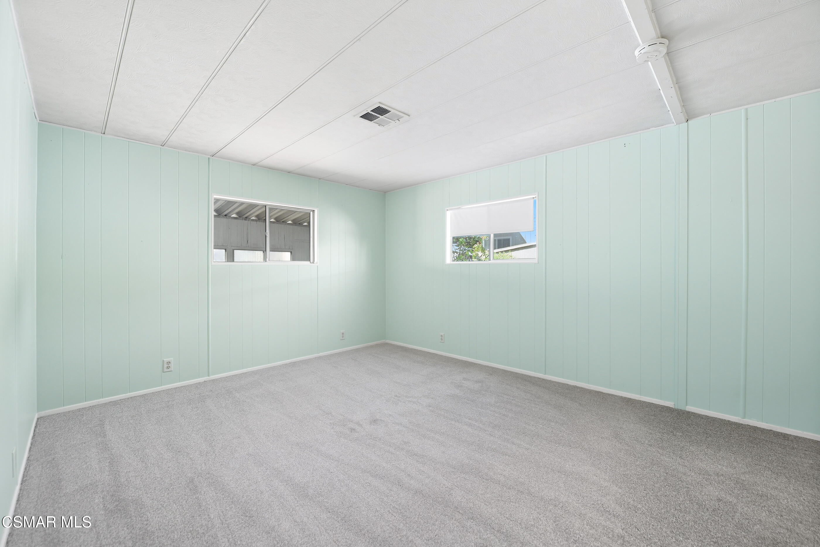 195 Tierra Rejada Road, Unit 178 Simi Valley, CA 93065 - Photo 19 of 49 an empty room with windows