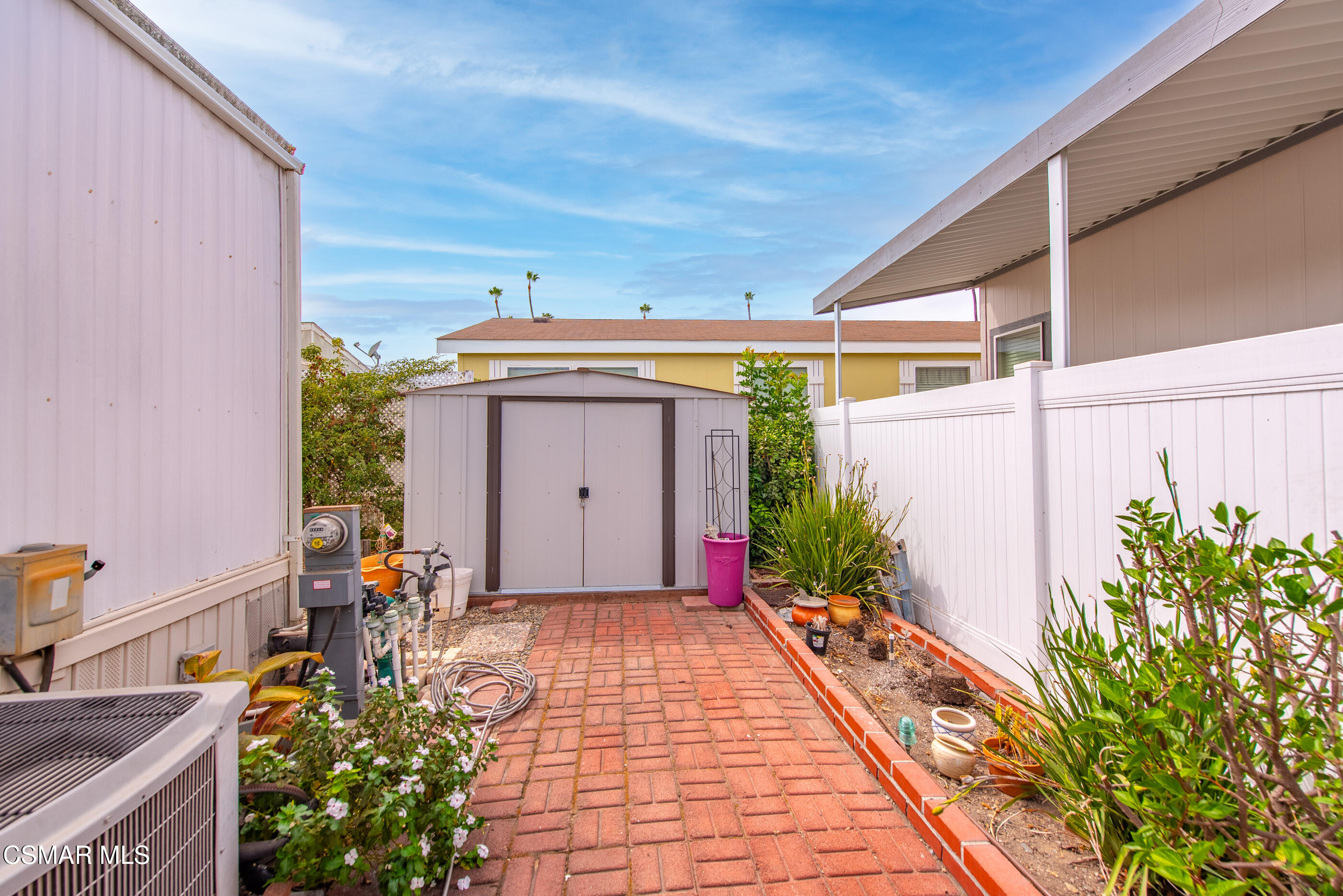 195 Tierra Rejada Road, Unit 178 Simi Valley, CA 93065 - Photo 26 of 49 a view of a house with potted plants
