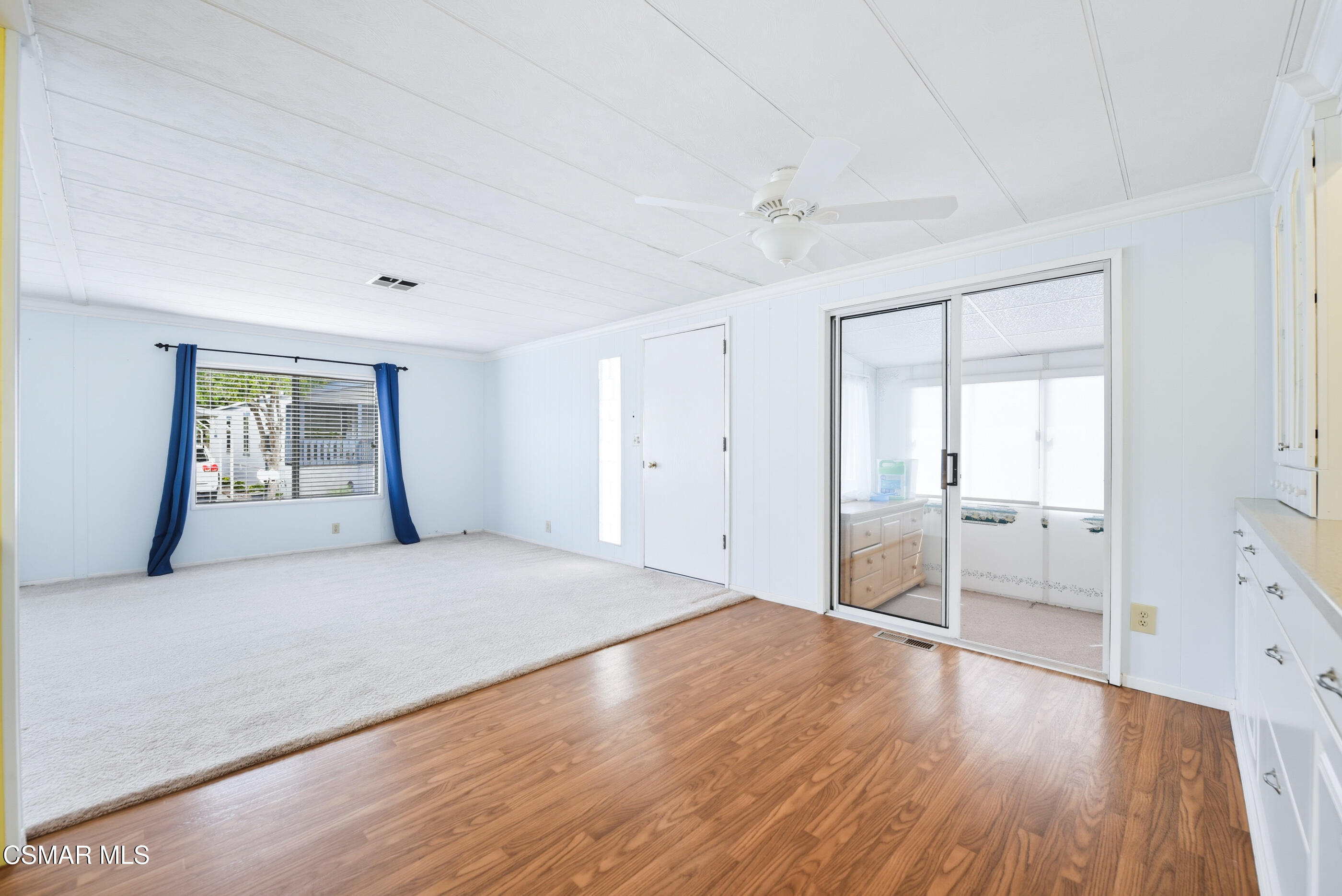 195 Tierra Rejada Road, Unit 178 Simi Valley, CA 93065 - Photo 10 of 49 a big room with wooden floor and windows