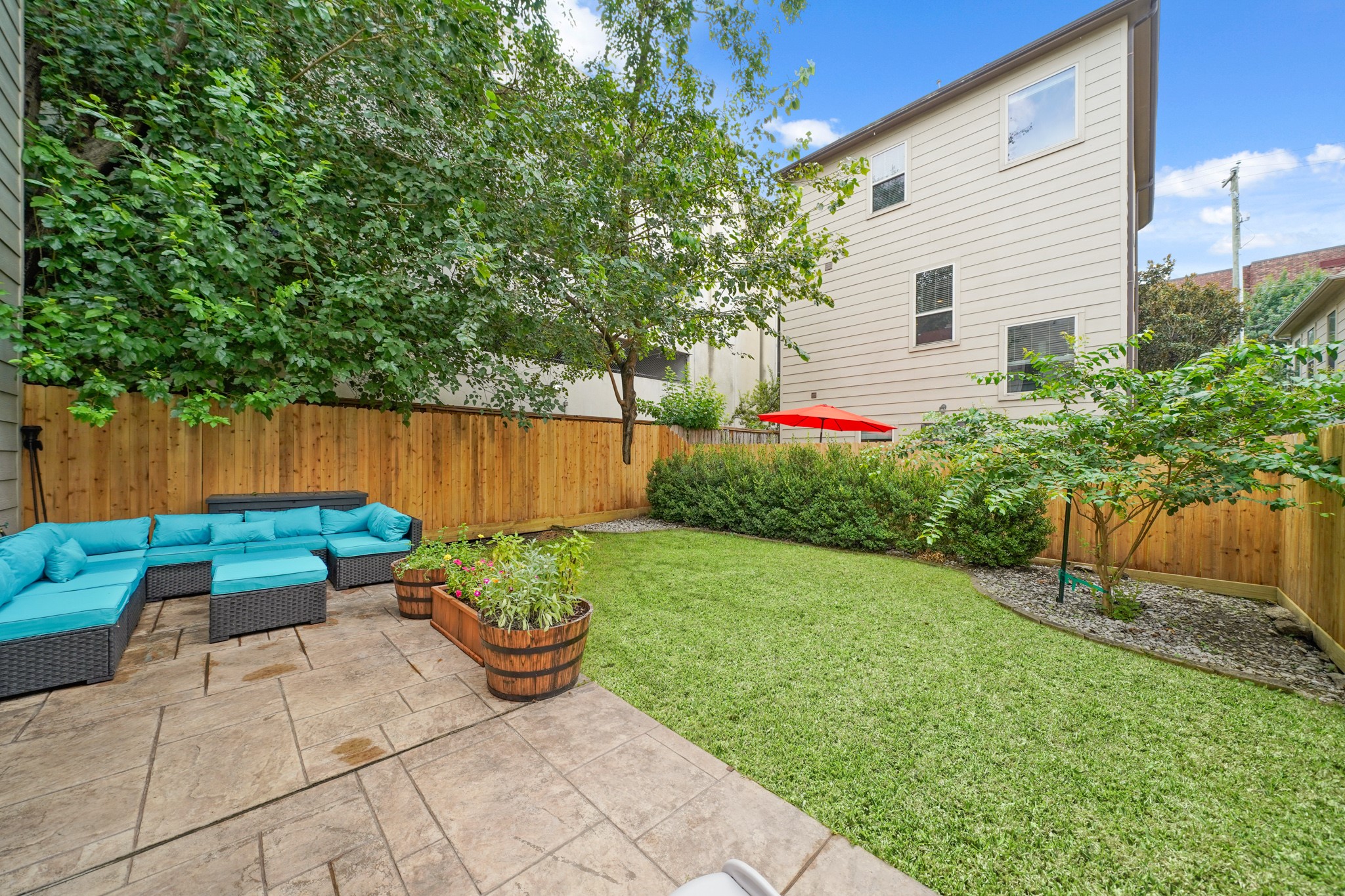 3808 Center Street, Unit A Houston, TX 77007 - Photo 14 of 31 a view of a backyard with furniture and a garden