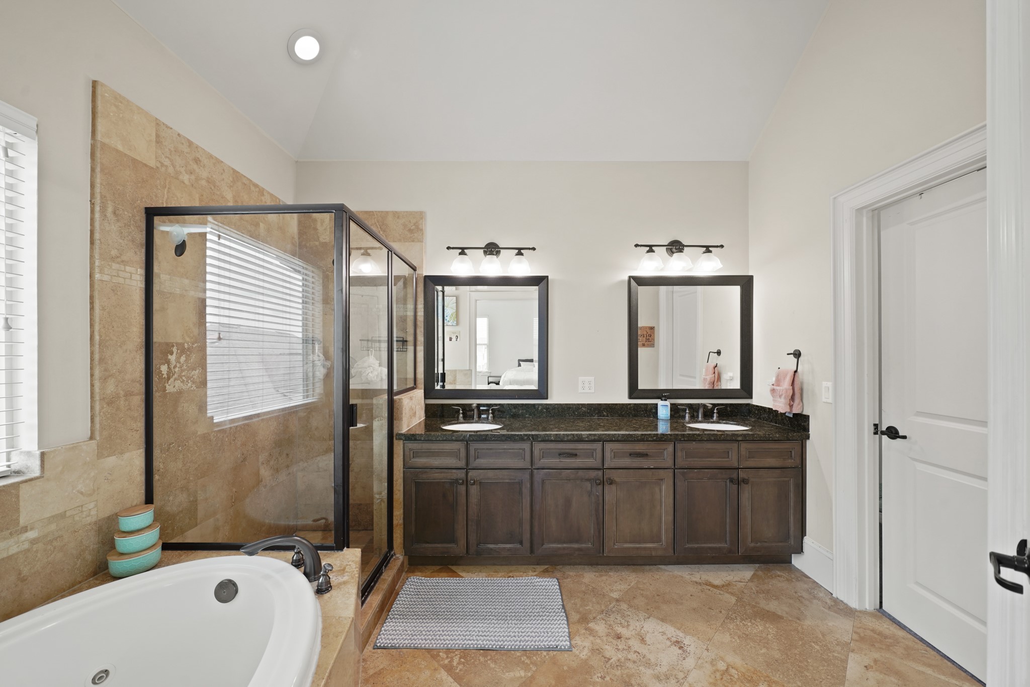 3808 Center Street, Unit A Houston, TX 77007 - Photo 19 of 31 a spacious bathroom with a tub sink and mirror