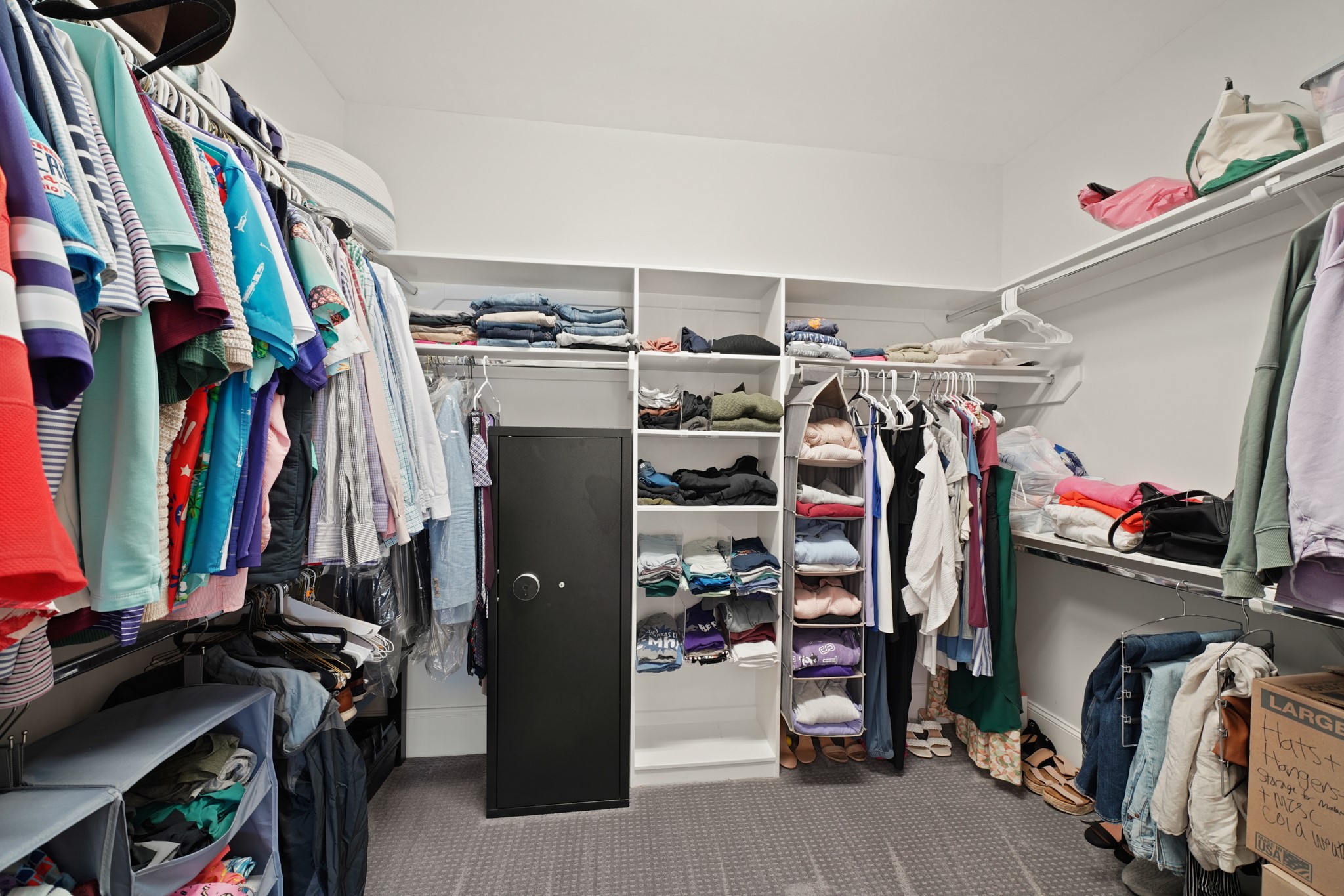 3808 Center Street, Unit A Houston, TX 77007 - Photo 21 of 31 a view of walk in closet with clothes and shoes