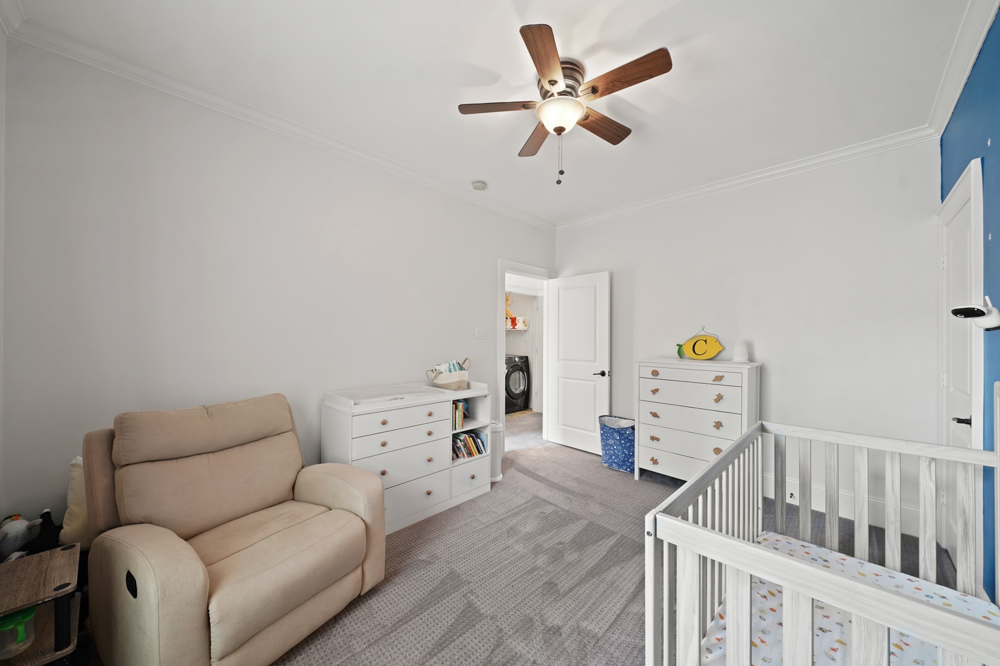 3808 Center Street, Unit A Houston, TX 77007 - Photo 24 of 31 a living room with furniture and a chandelier