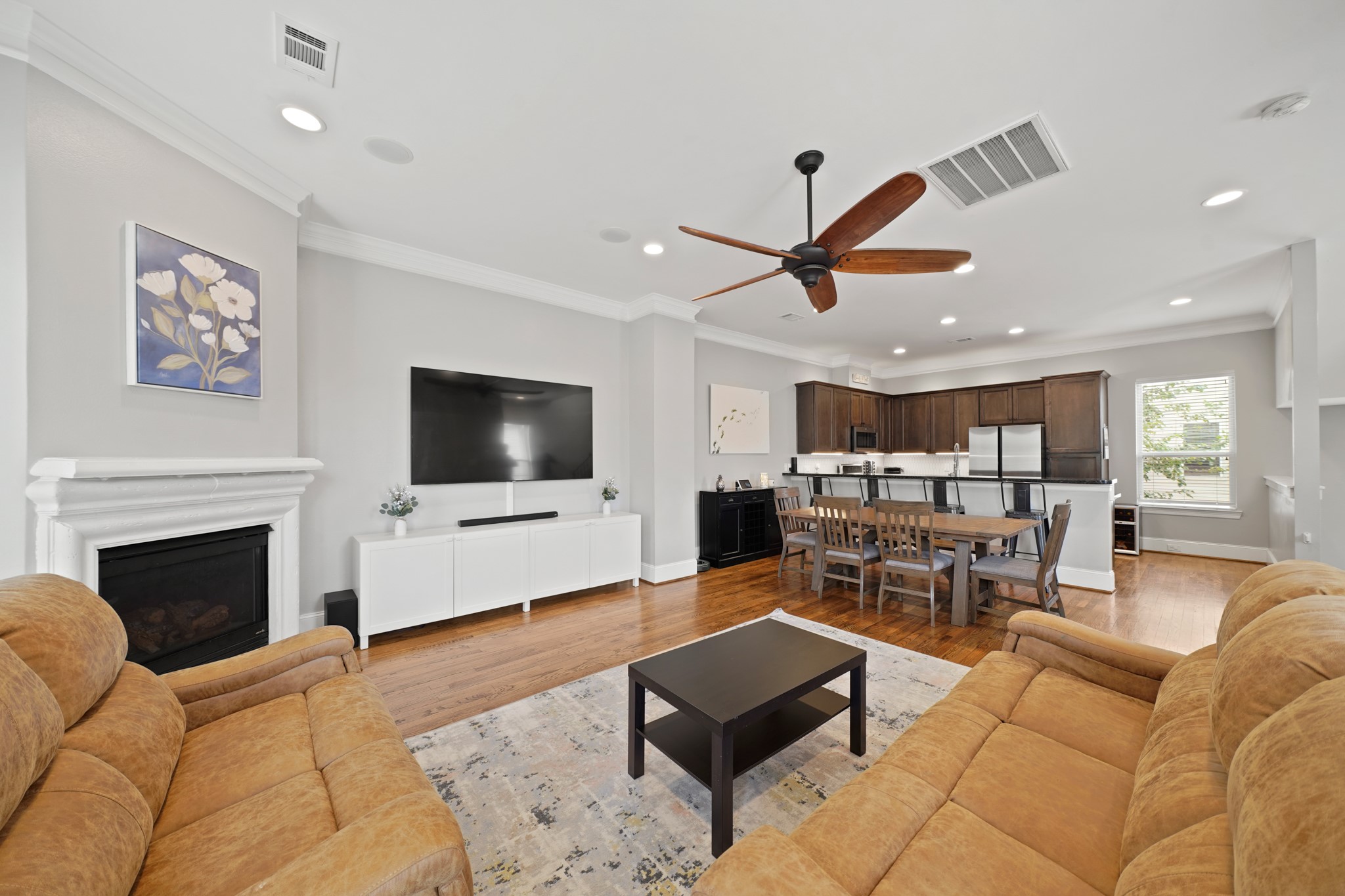 3808 Center Street, Unit A Houston, TX 77007 - Photo 8 of 31 a living room with furniture and a flat screen tv
