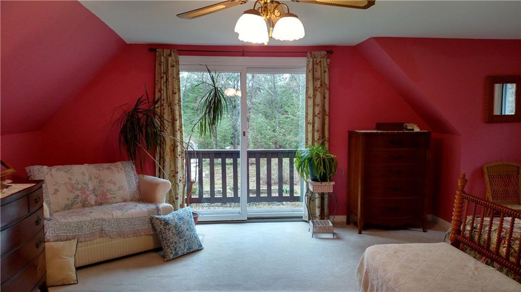 240 Manchester Road Steep Falls, ME 04085 - Photo 13 of 30 master bedroom with balcony looking...