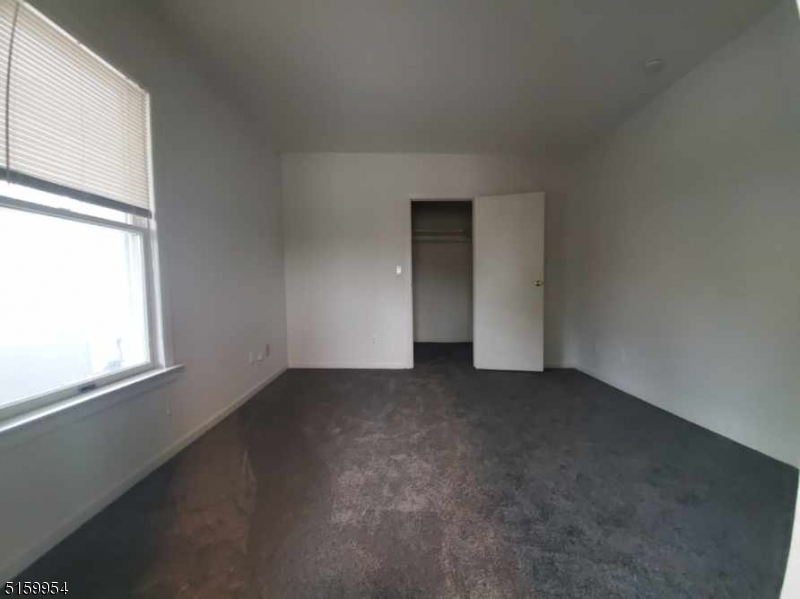 2 Main Street, Unit 1 Branchville, NJ 07826 - Photo 5 of 11 an empty room with a window