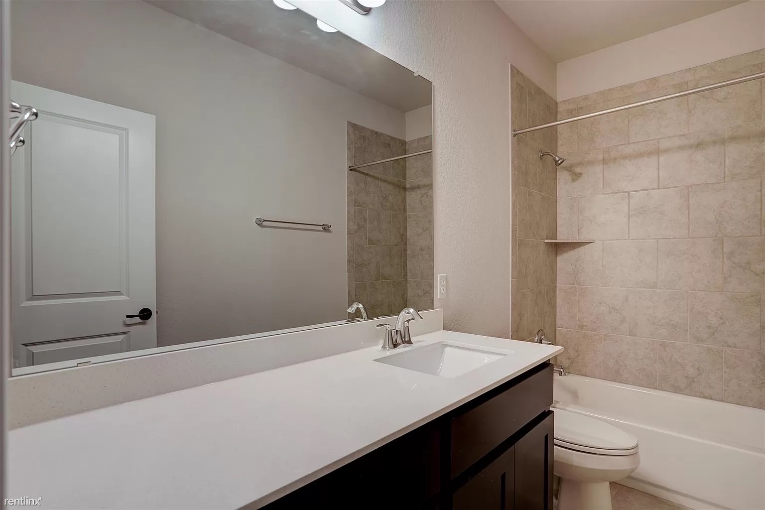 1809 Turtle Bay Loop Leander, TX 78641 - Photo 17 of 30 a bathroom with a sink a toilet and shower