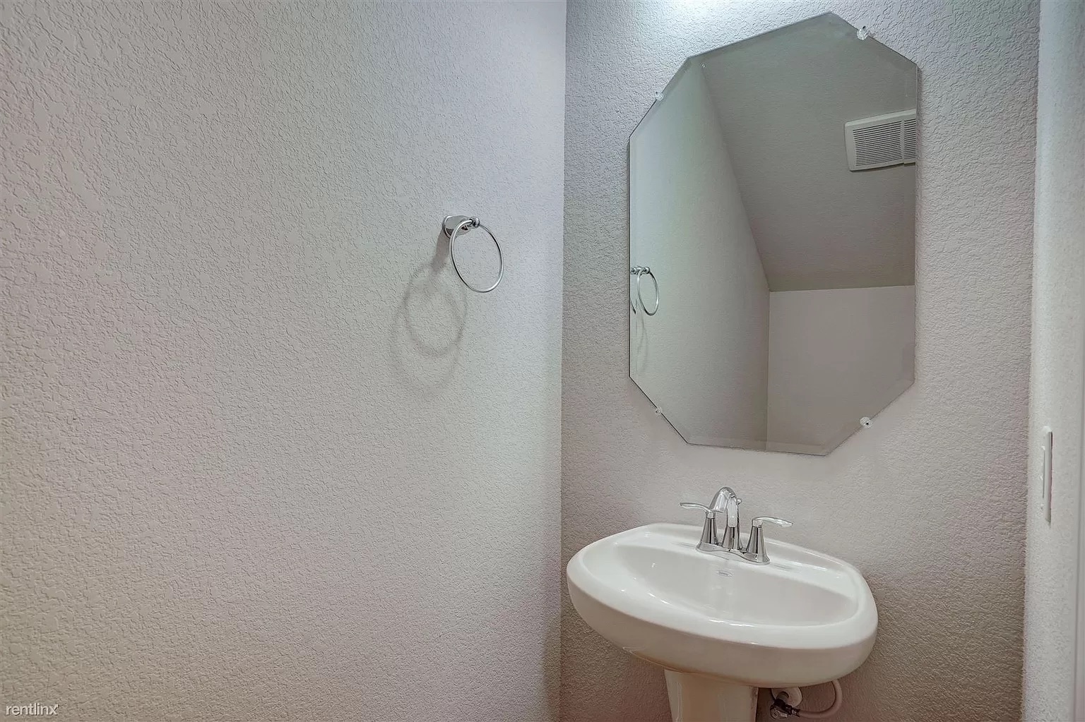 1809 Turtle Bay Loop Leander, TX 78641 - Photo 19 of 30 a bathroom with a sink and mirror