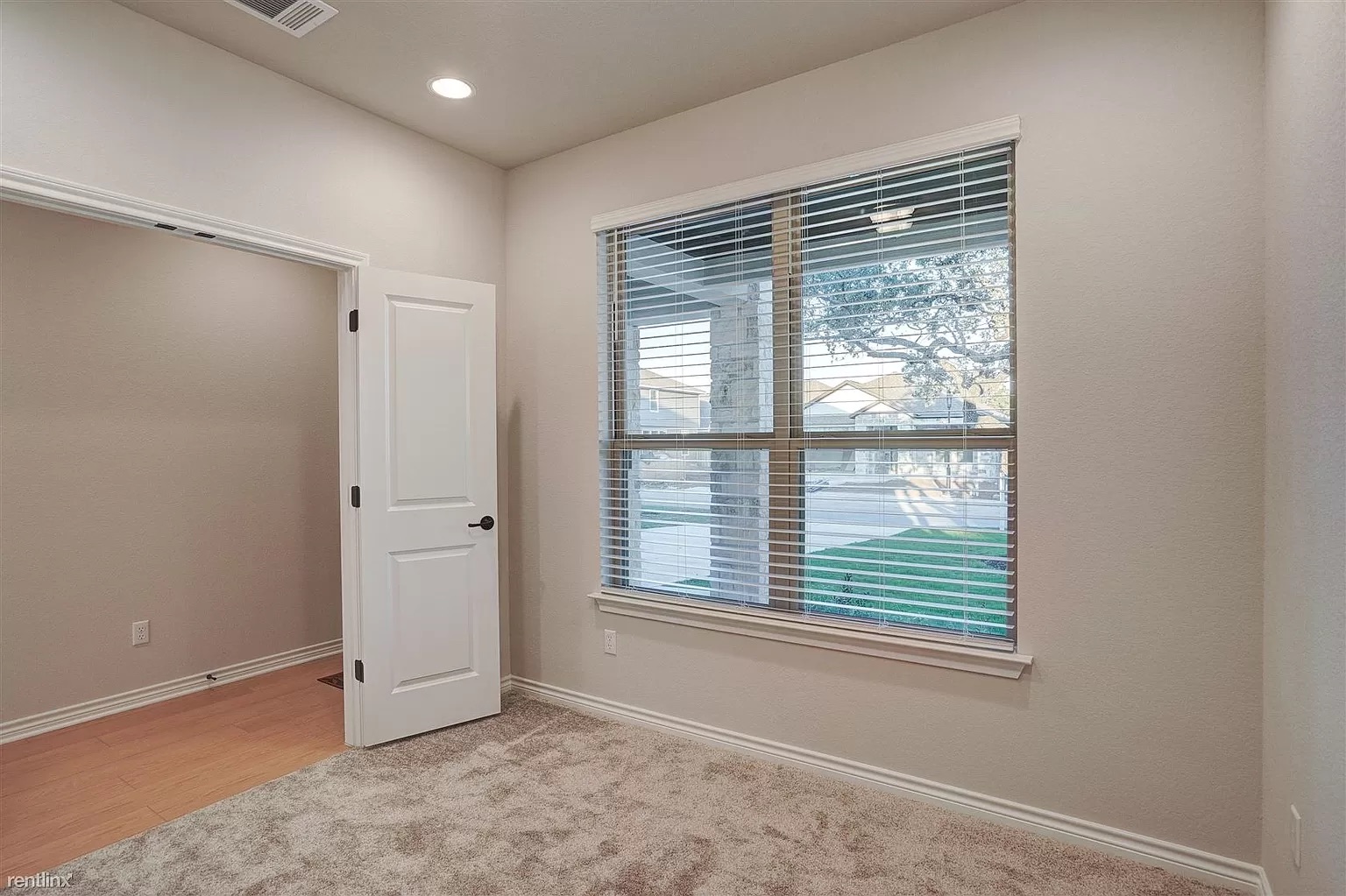 1809 Turtle Bay Loop Leander, TX 78641 - Photo 2 of 30 a view of an empty room with a window
