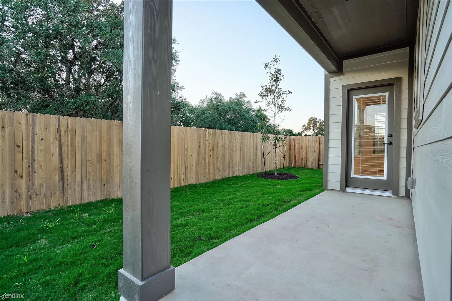 1809 Turtle Bay Loop Leander, TX 78641 - Photo 21 of 30 a view of a backyard with wooden fence