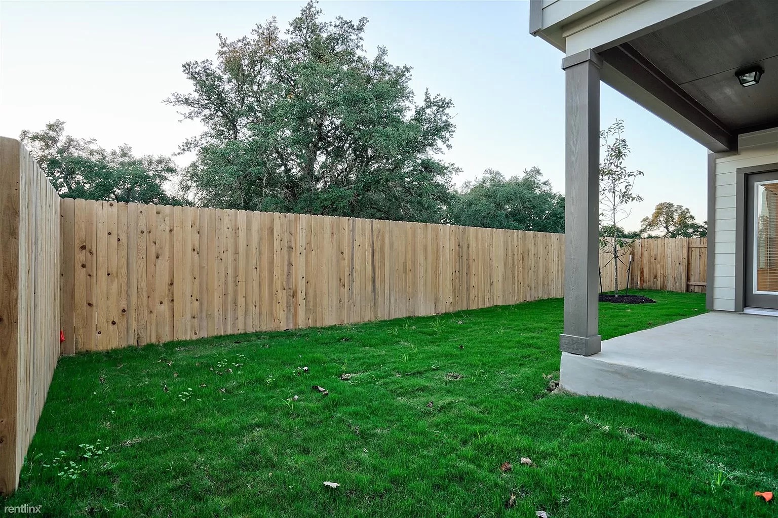 1809 Turtle Bay Loop Leander, TX 78641 - Photo 24 of 30 a view of backyard with wooden fence