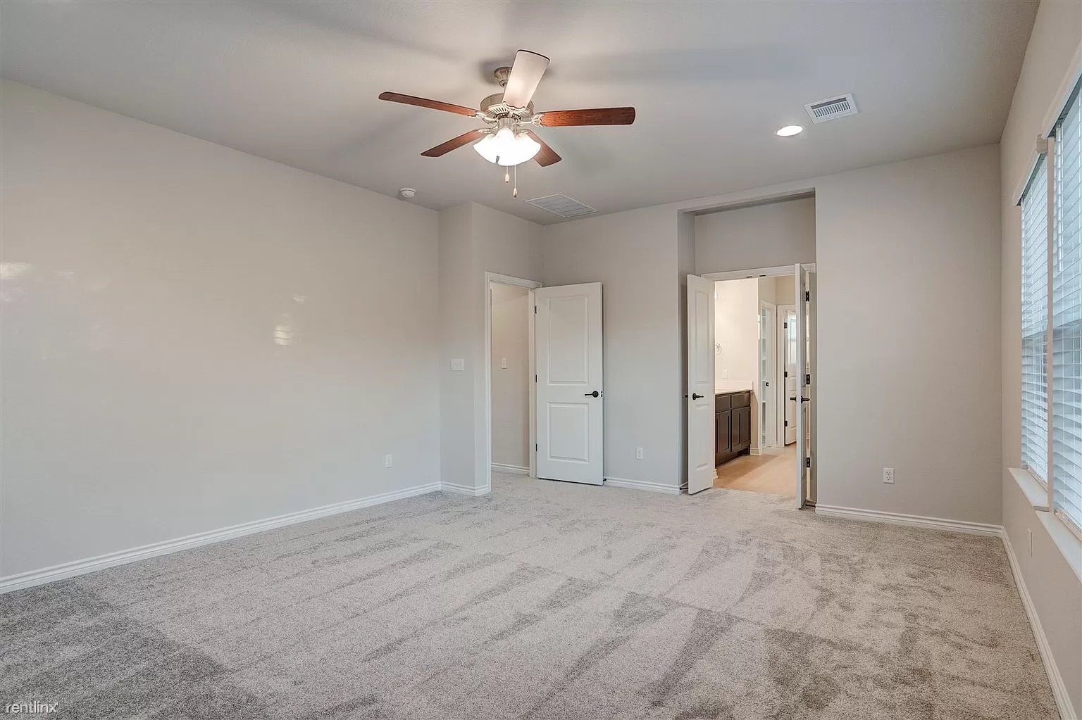 1809 Turtle Bay Loop Leander, TX 78641 - Photo 10 of 30 an empty room with closet and windows