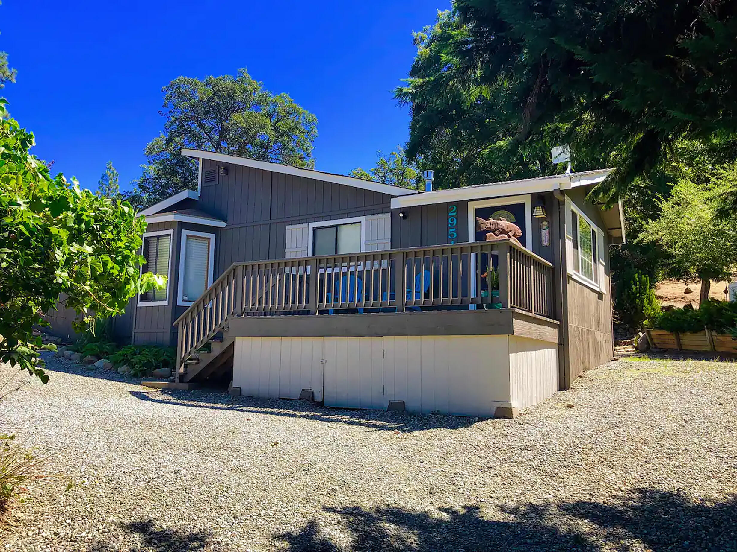 2951 Lewiston Road Lewiston, CA 96052 - Photo 1 of 27 a view of a house with a wooden fence