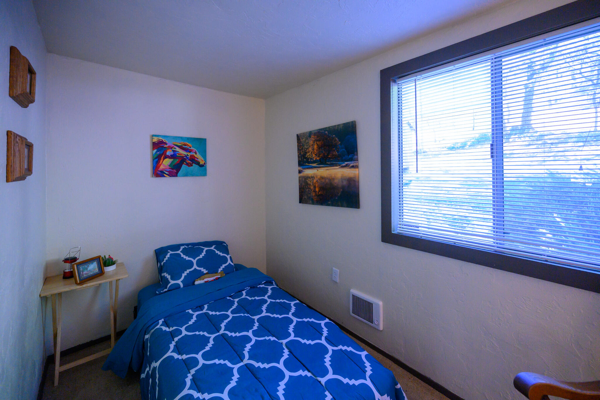 2951 Lewiston Road Lewiston, CA 96052 - Photo 20 of 27 a bedroom with a bed and a window