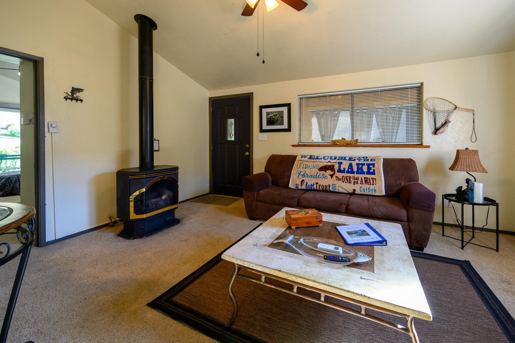 2951 Lewiston Road Lewiston, CA 96052 - Photo 8 of 27 a living room with furniture and a flat screen tv