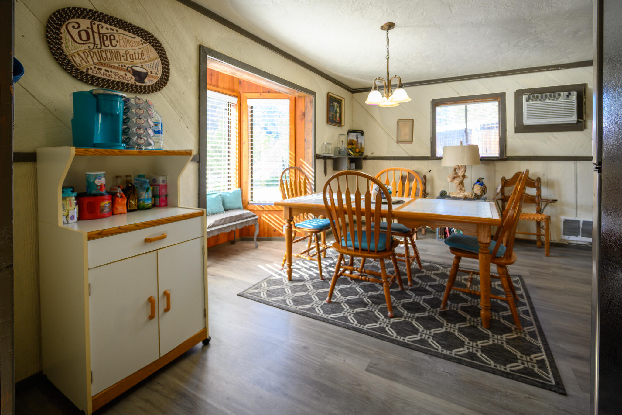 2951 Lewiston Road Lewiston, CA 96052 - Photo 9 of 27 a view of a dining room with furniture window and wooden floor
