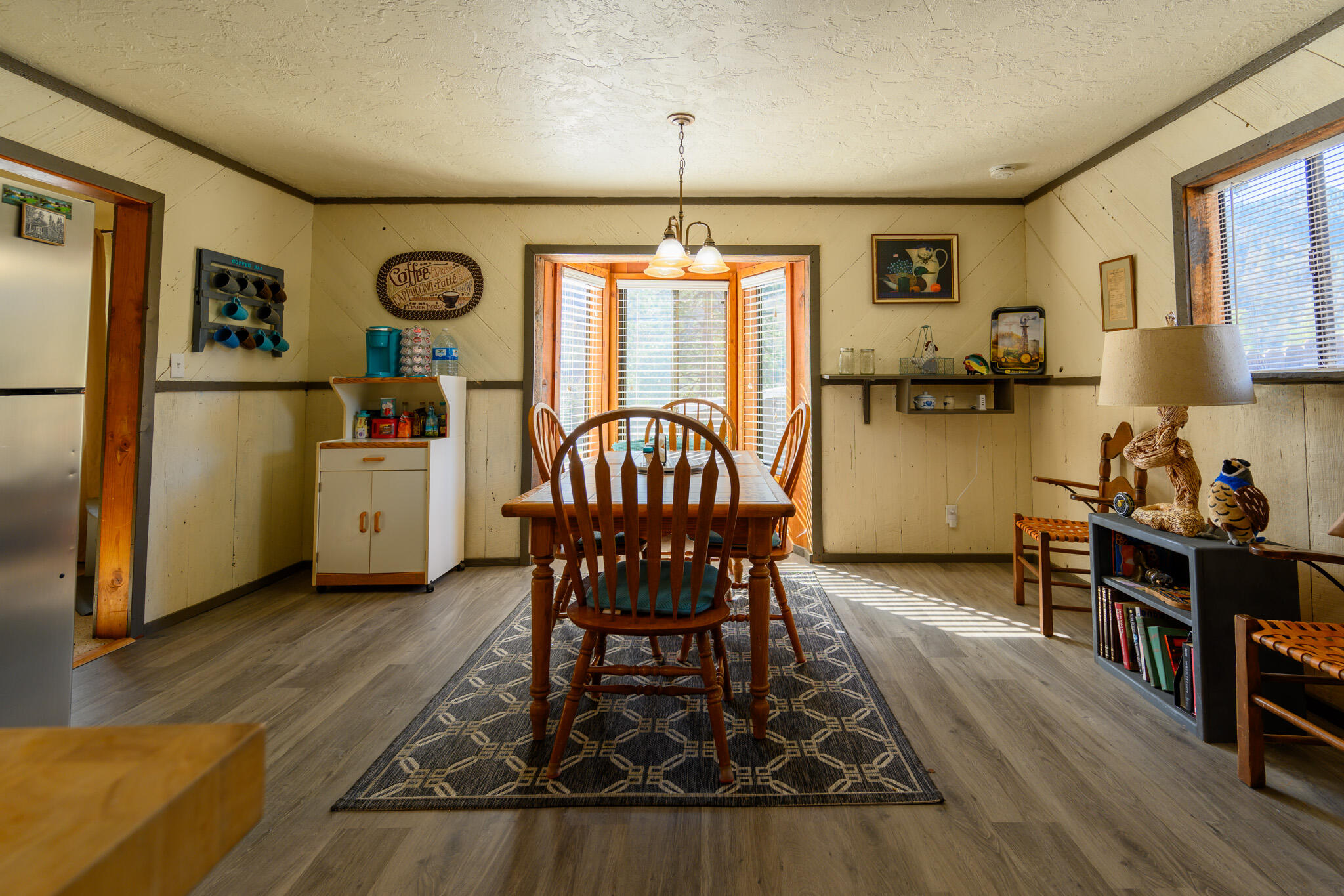 2951 Lewiston Road Lewiston, CA 96052 - Photo 10 of 27 a view of a dining room with furniture window and wooden floor