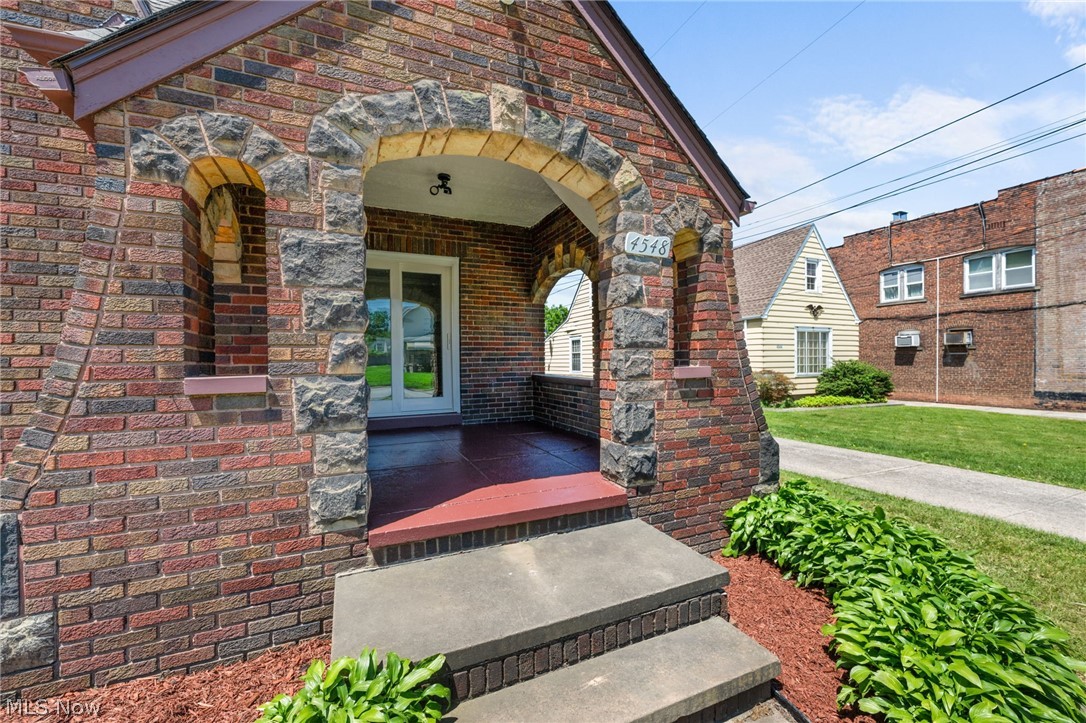 4548 Turney Road Cleveland, OH 44105 - Photo 3 of 35 View of exterior entry featuring a front porch