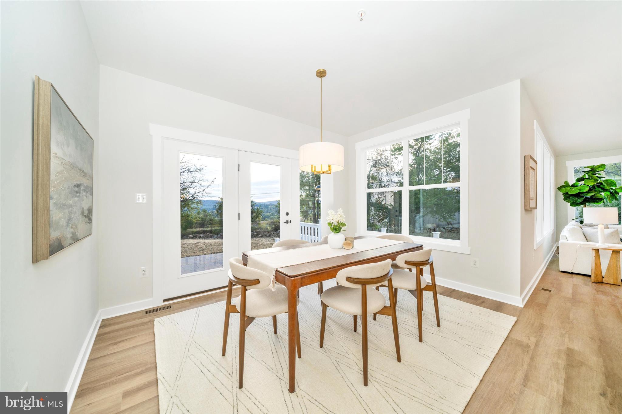 Old Bachmans Valley Road Westminster, MD 21157 - Photo 15 of 49 a table and chairs in a room