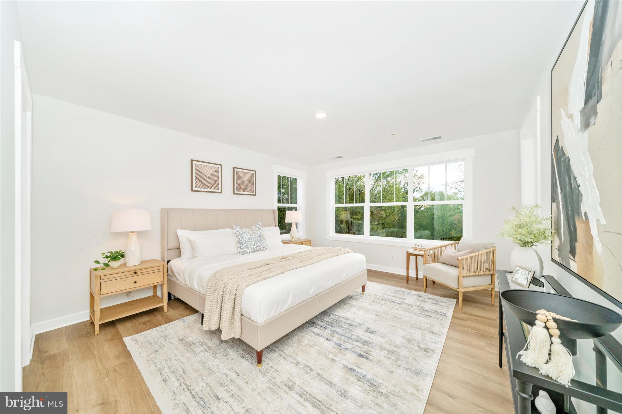 Old Bachmans Valley Road Westminster, MD 21157 - Photo 22 of 49 a large bedroom with a bed and wooden floor
