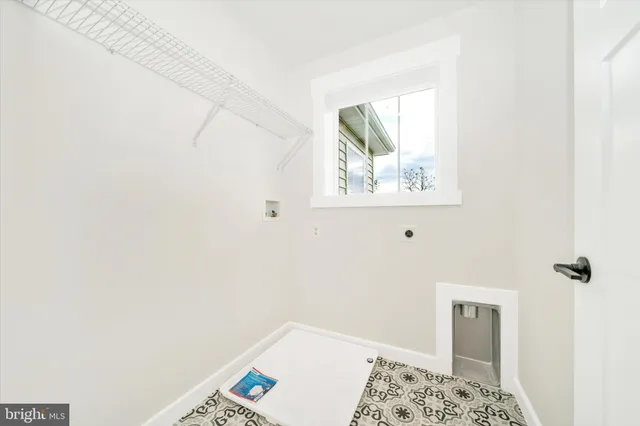 a view of room with window and closet