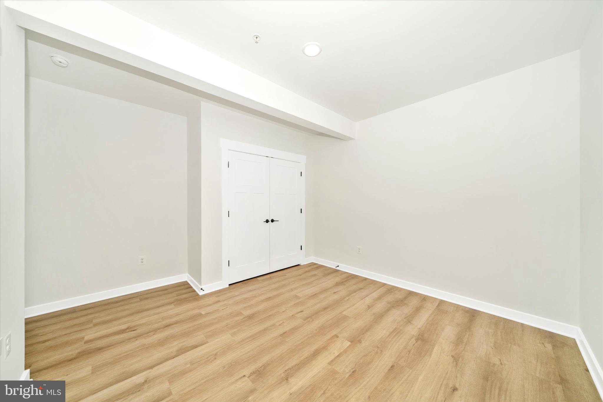 Old Bachmans Valley Road Westminster, MD 21157 - Photo 48 of 49 an empty room with wooden floor