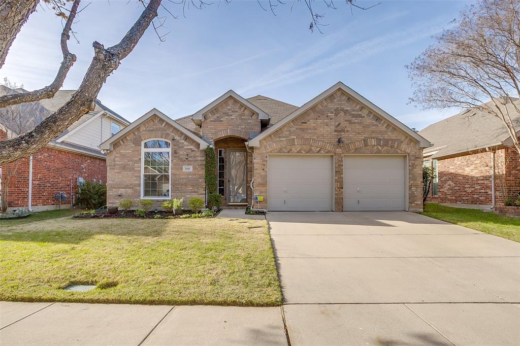 8105 Hosta Way Fort Worth, TX 76123 - Photo 1 of 33 a front view of a house with a yard