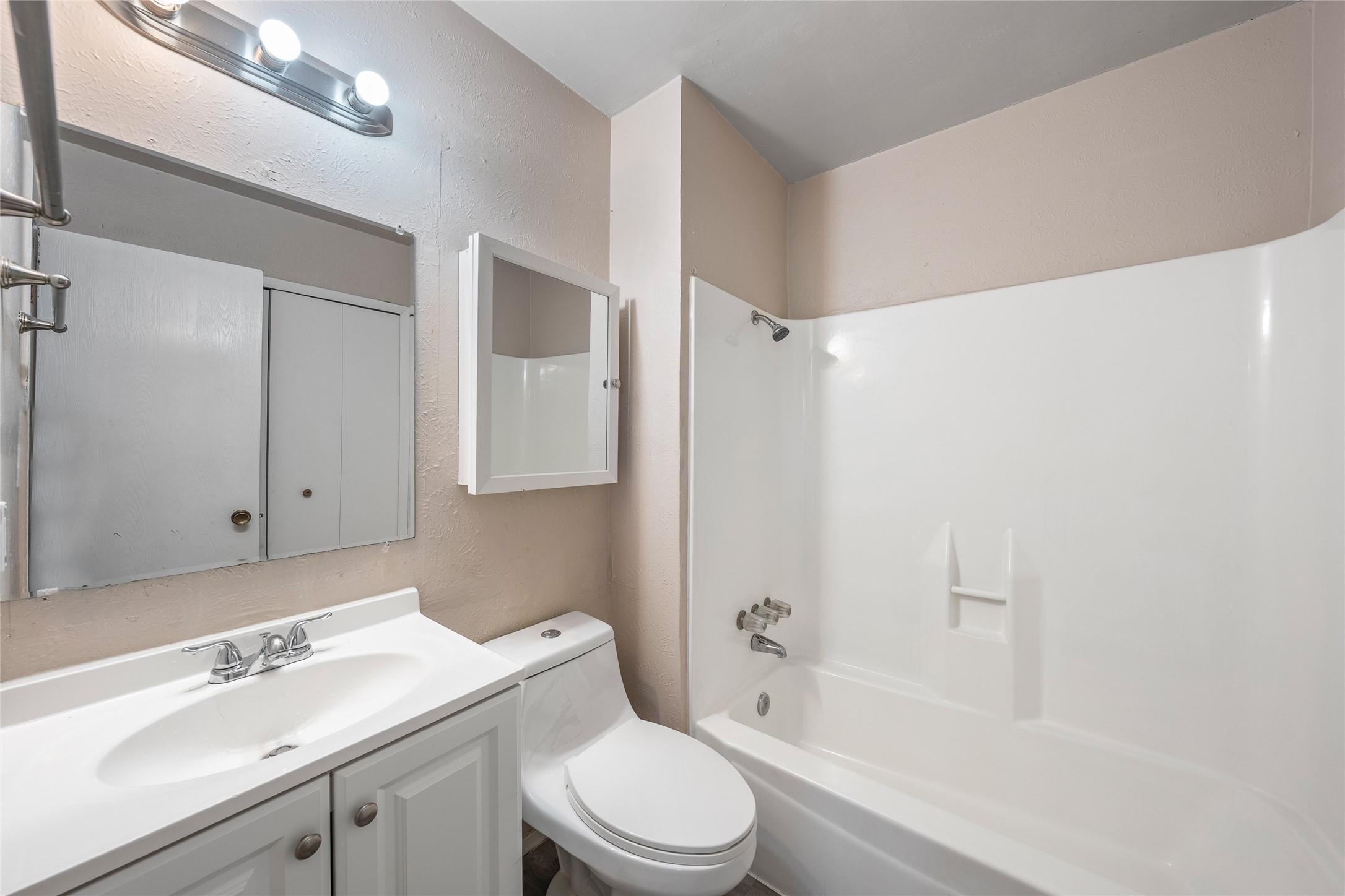 1111 West Rundberg Lane Austin, TX 78758 - Photo 12 of 16 A well-maintained bathroom provides a refreshing space for daily routines.