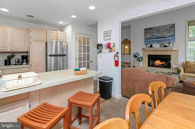 a bathroom with a sink a mirror and a shower