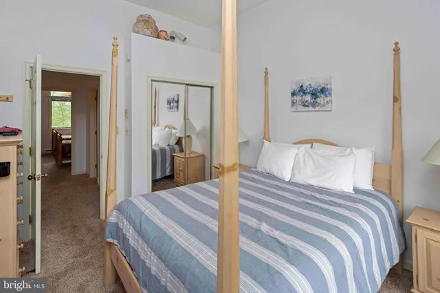 a view of kitchen with furniture and wooden floor